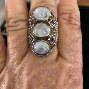 Ring with 3 white and clear looking stones